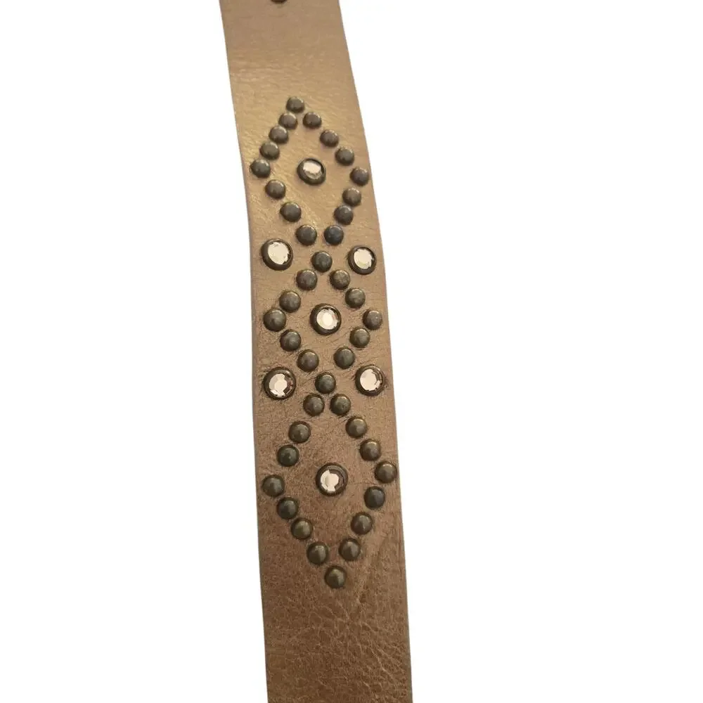 Vintage Leatherock studded belt with cross buckle.